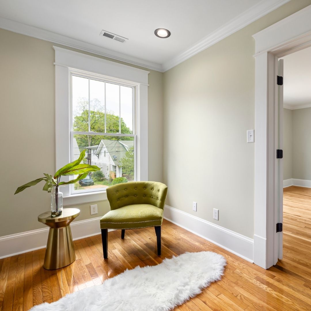 Beautiful hardwood floor with green chair