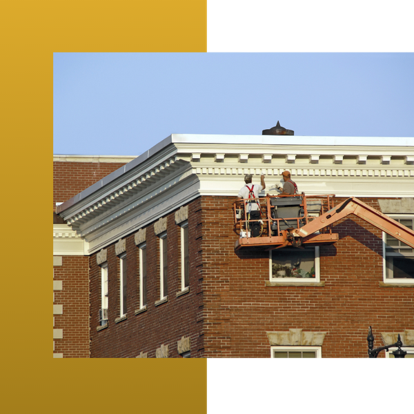 painting exterior of commercial building