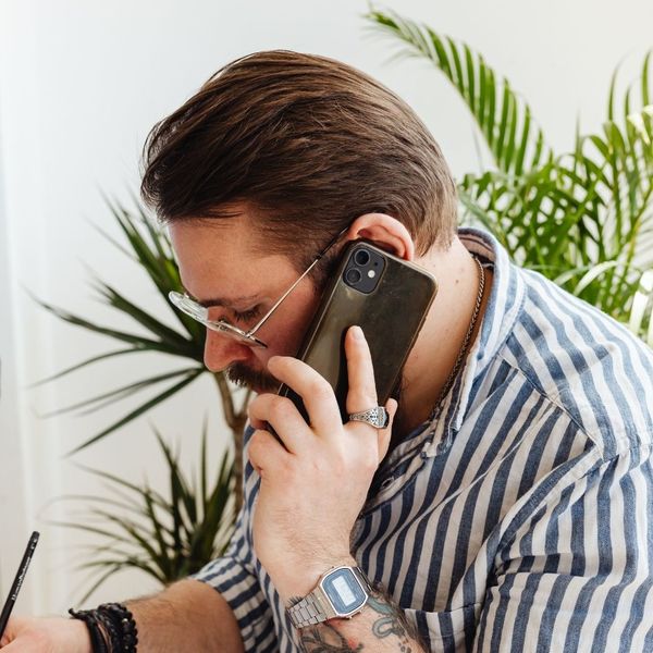 A man speaking on the phone