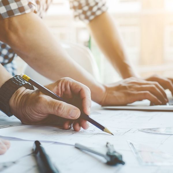 A contractor going over documents