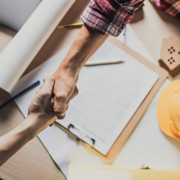 Contractors shaking hands