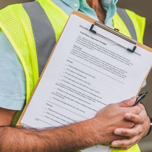 a person with an inspection list Water Damage Icon.jpg