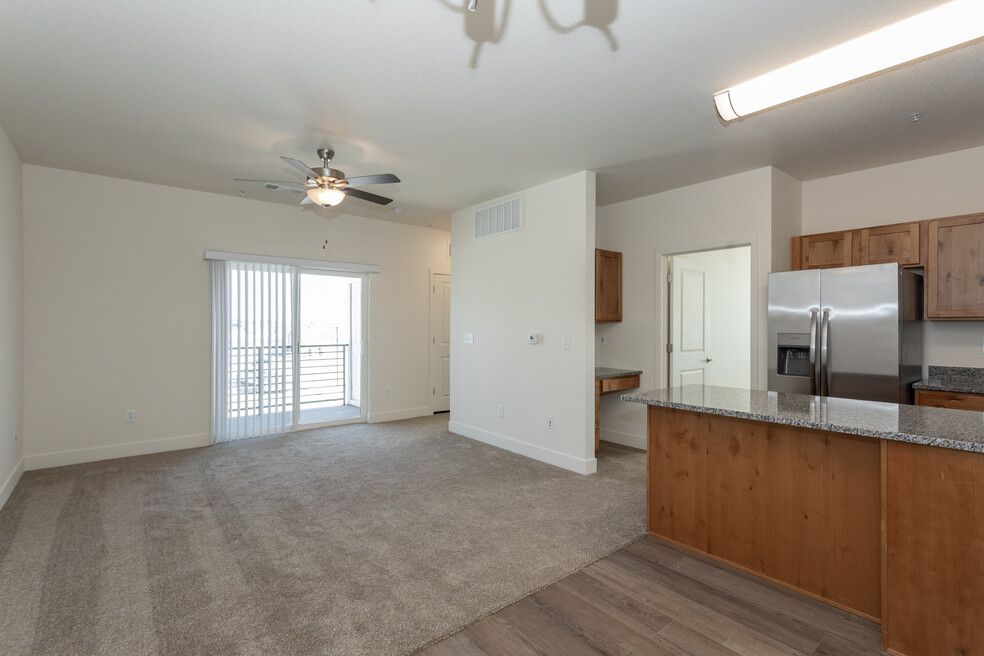 living room with kitchen nearby