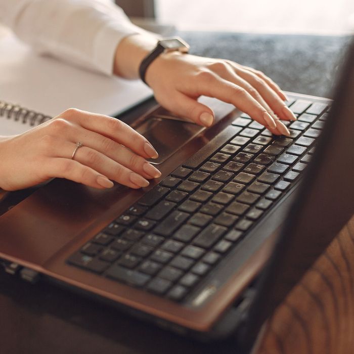 person using a computer peerson using a computer