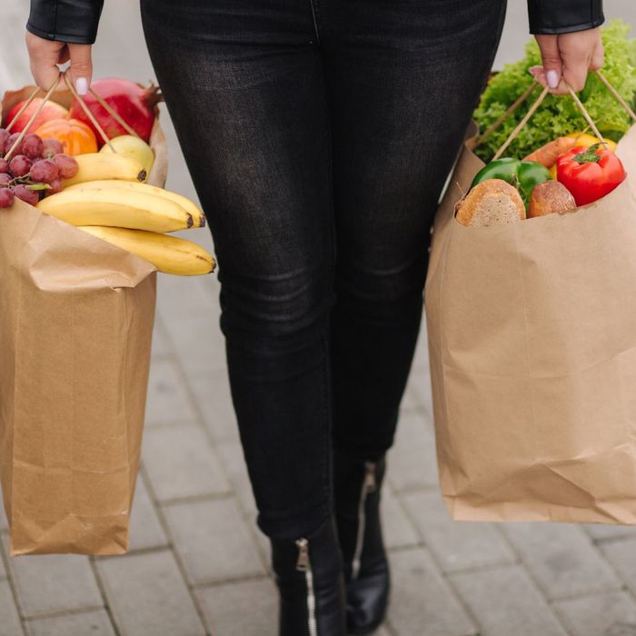 person carrying groceries