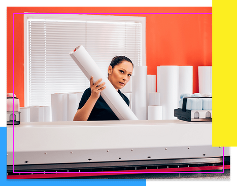 woman working at poster printing shop