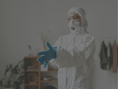 Woman securing biohazard equipment to clean