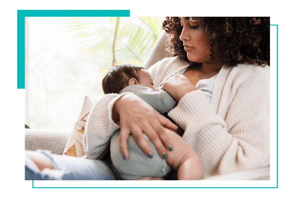 woman holding new baby