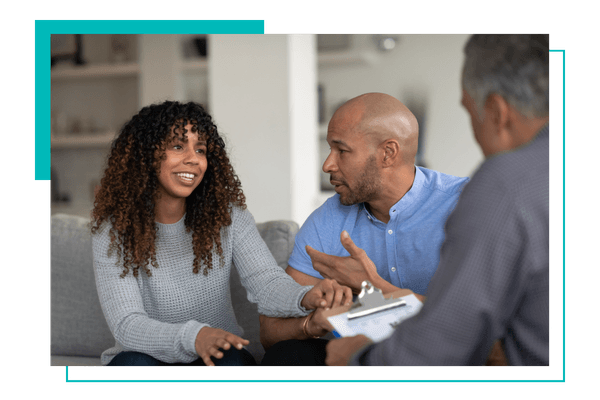 two family members with a therapist