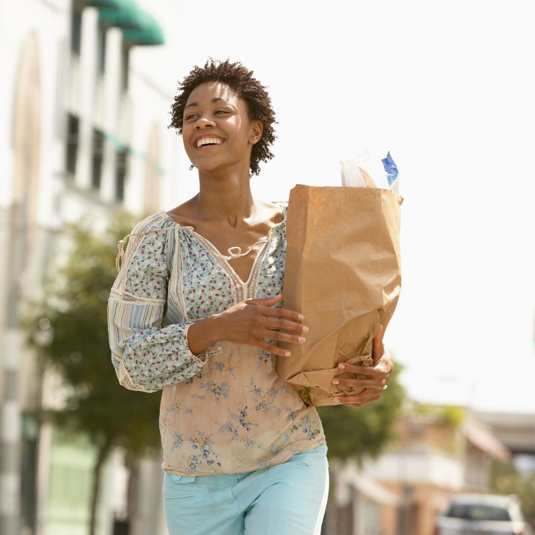 photo of woman running errands