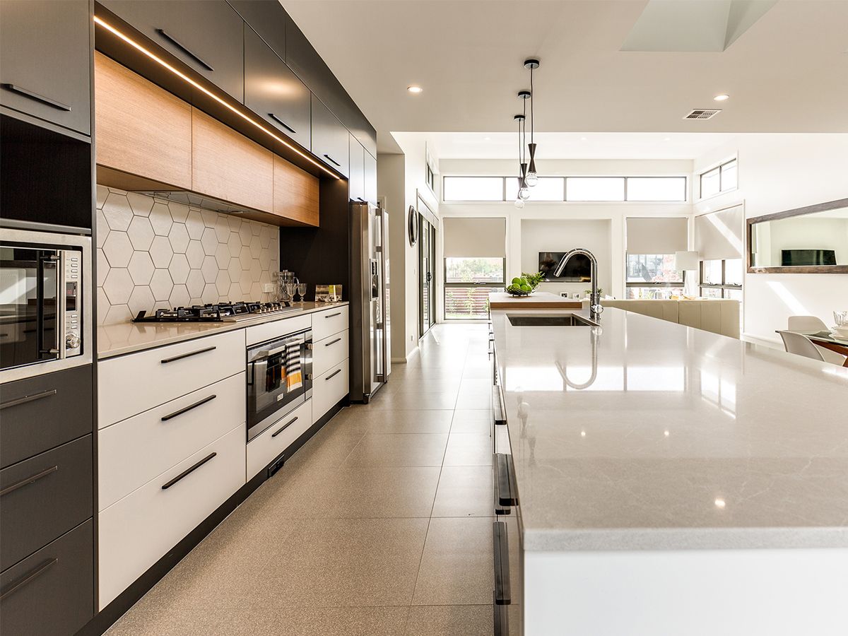  Luxury home kitchen that is spotless.