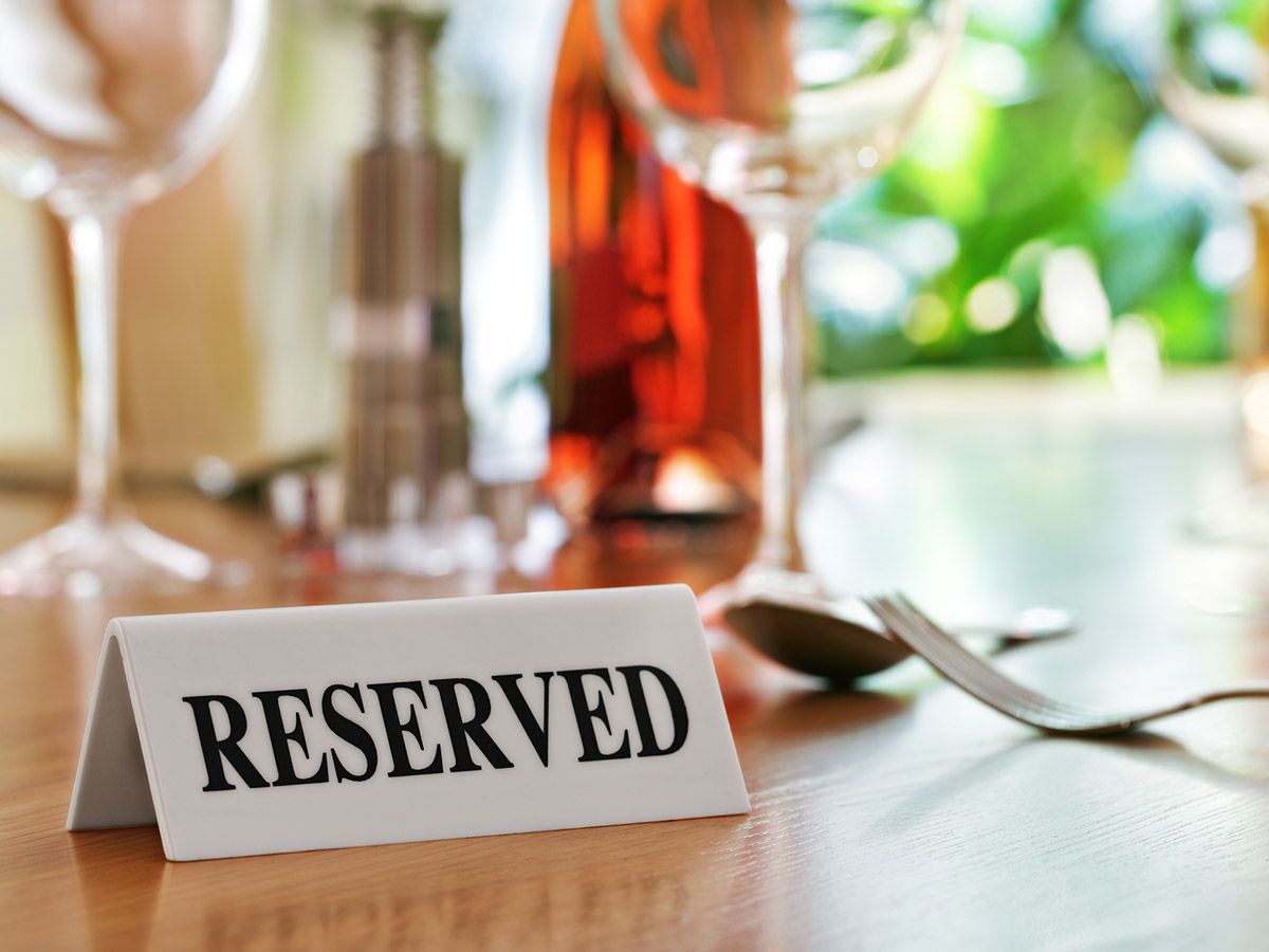 reserved sign on dinner table