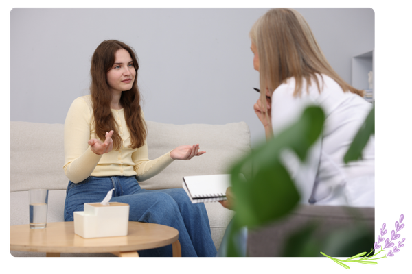female therapy patient and female therapist talking
