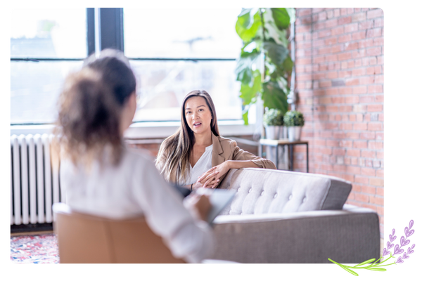 female therapist and female patient talking