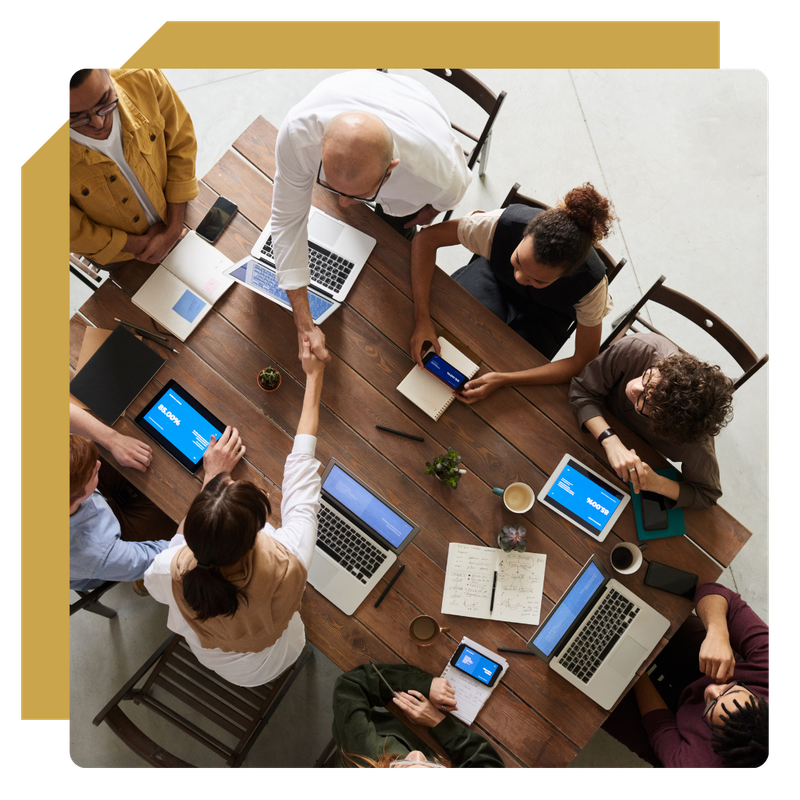 board meeting with computers 