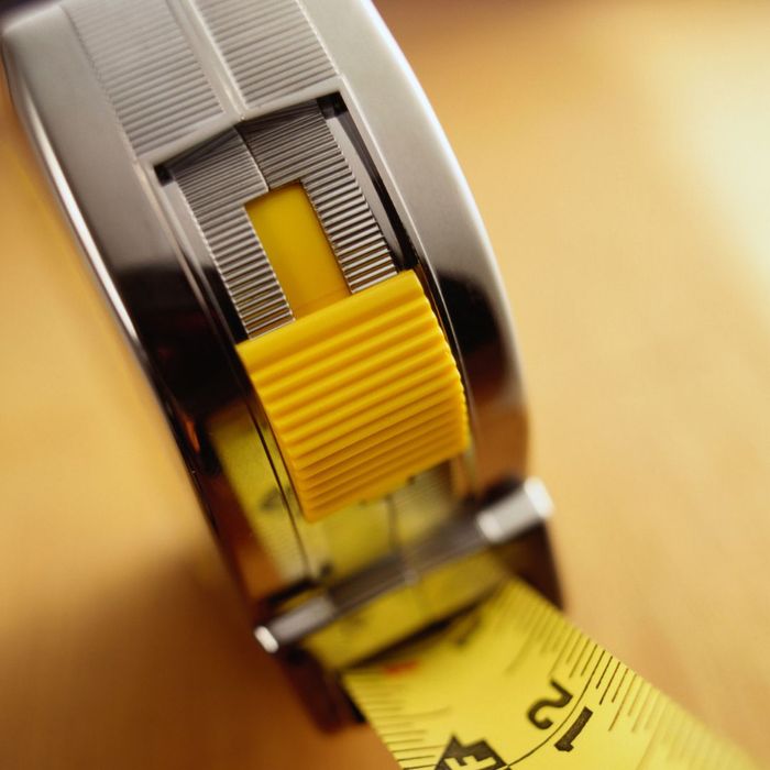 1_-_silver_tape_measure_with_yellow_tape[1].jpg