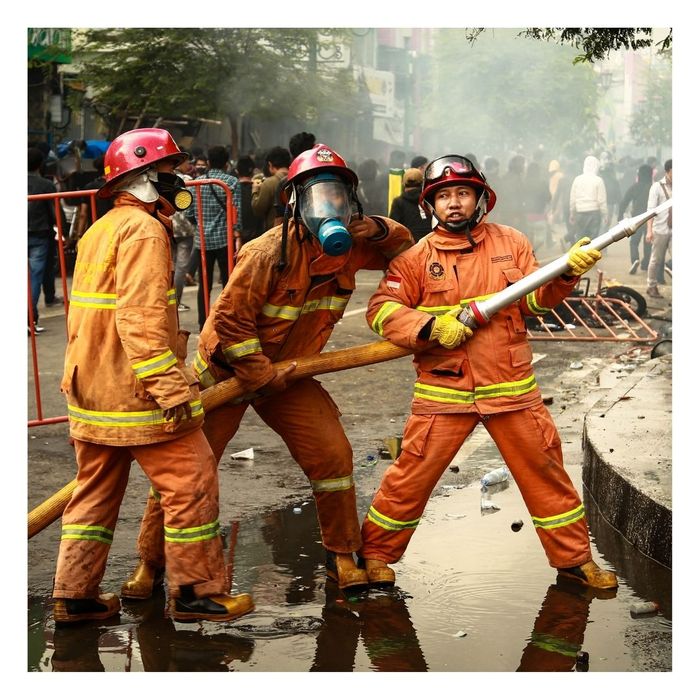 firefighters putting out fire