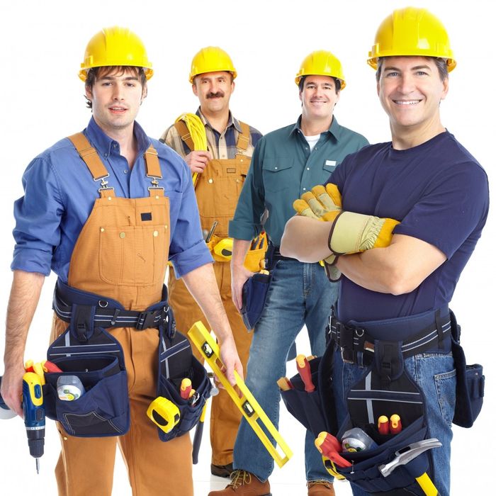 confident contractors in hard hats