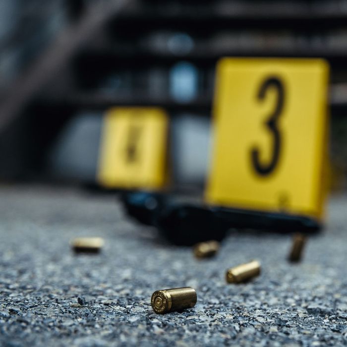 3_-_blurred_image_of_crime_scene_markers_and_shell_casings[1].jpg