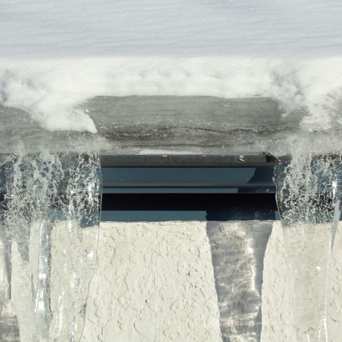 Ice dams forming on gutters