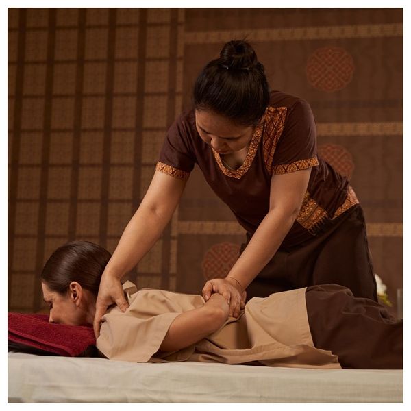 woman getting Thai massage