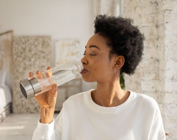 Woman drinking clean water. Woman drinking clean water.