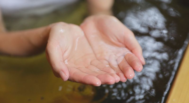 holding water in hands holding water in hands