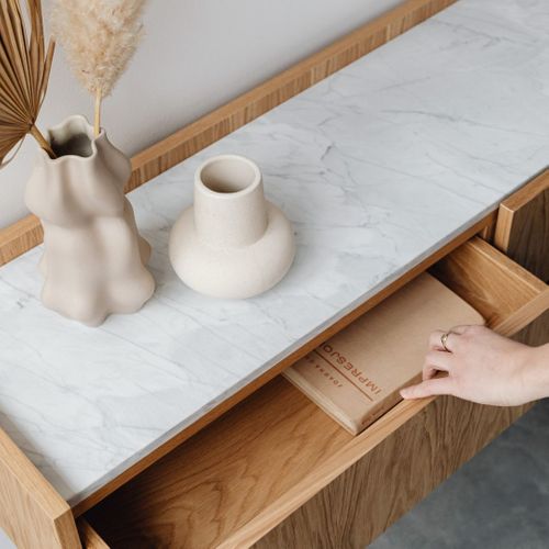 person opening a drawer