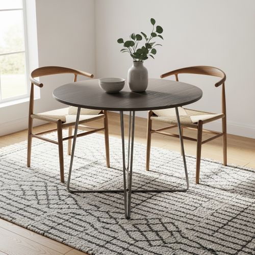 small dining table on a rug