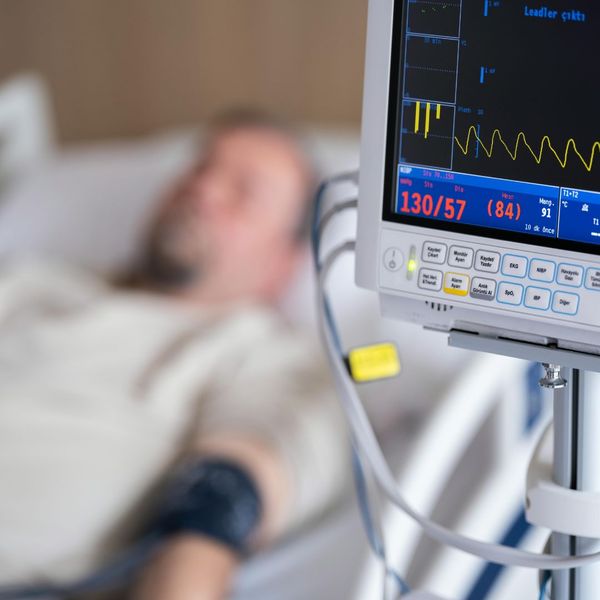 patient rests safely in a hospital bed as essential life support equipment like a ventilator and IV pump continue to function seamlessly during a power outage