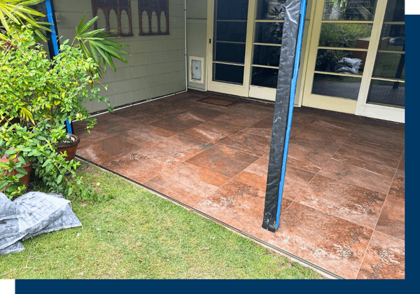 A tiled outdoor lanai in Hawaii, an area that qualifies for the pressure washing promotion.