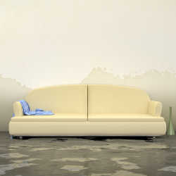 A water damaged couch and floor