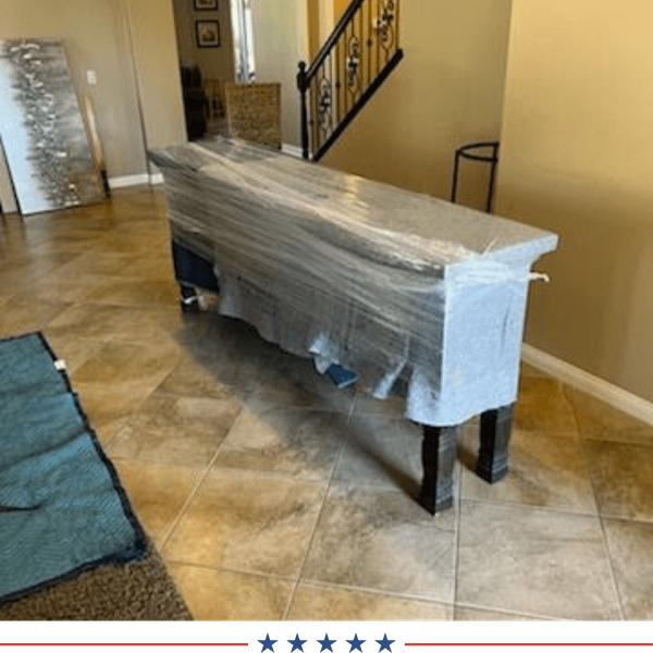 furniture being wrapped for a move