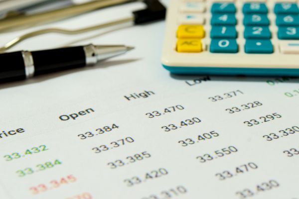 papers with numbers and a calculator on a table Course Overview_4.jpg