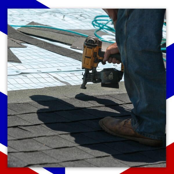 roof contractor putting on shingles