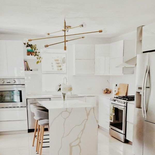 clean kitchen with white cabinets