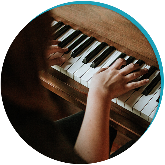 Hands playing piano