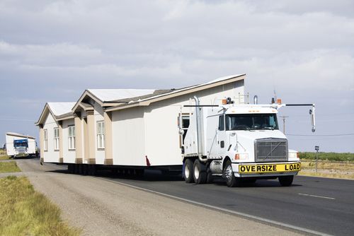 Mobile Home carried on a flatbed