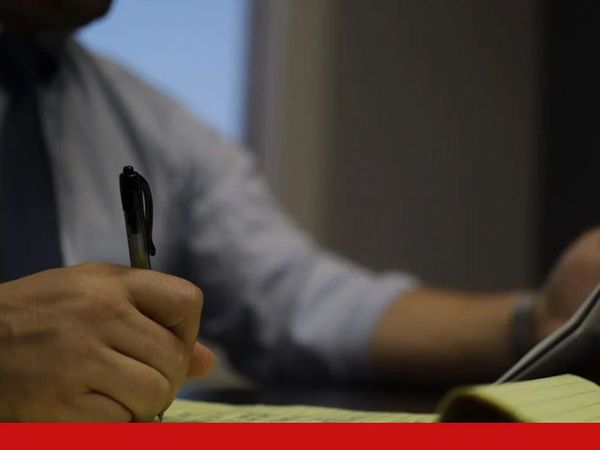 Image of a lawyer writing