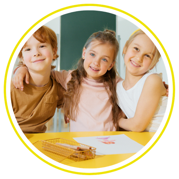 three children sitting at a table three children sitting at a table