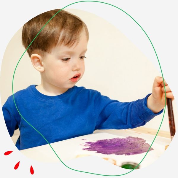 Little boy painting