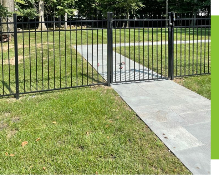 commercial sidewalk into gated area