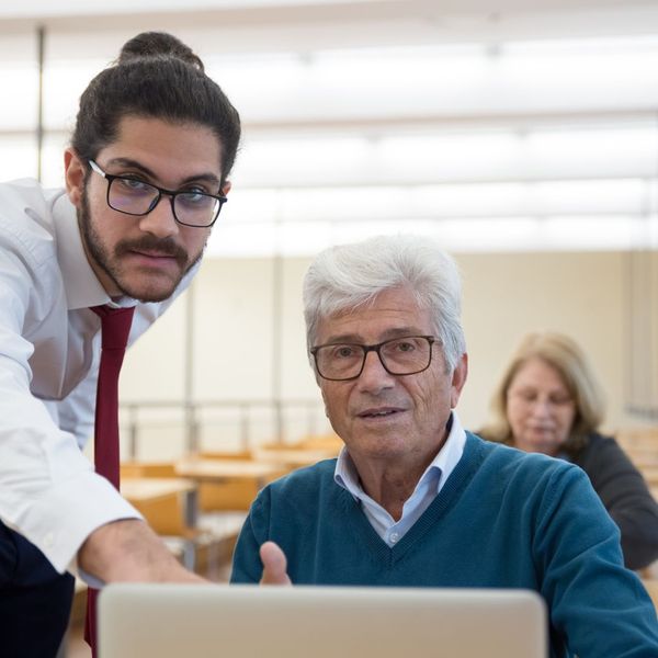 teacher helping a mature student