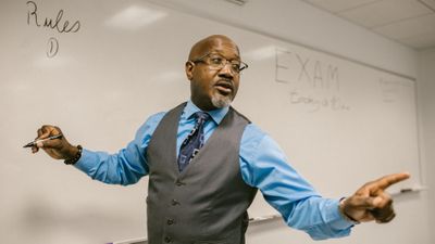 Teacher at the front of class