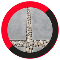 close-up of modern concrete patio slabs with decorative gaps filled with smooth river rocks, framed by a red and black circular border. close-up of modern concrete patio slabs with decorative gaps filled with smooth river rocks, framed by a red and black circular border.