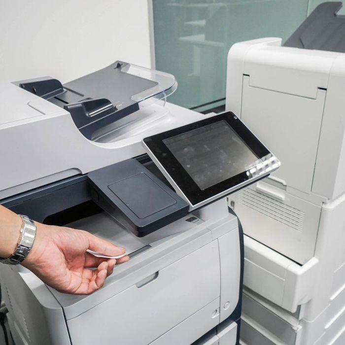 employee using MCF printer