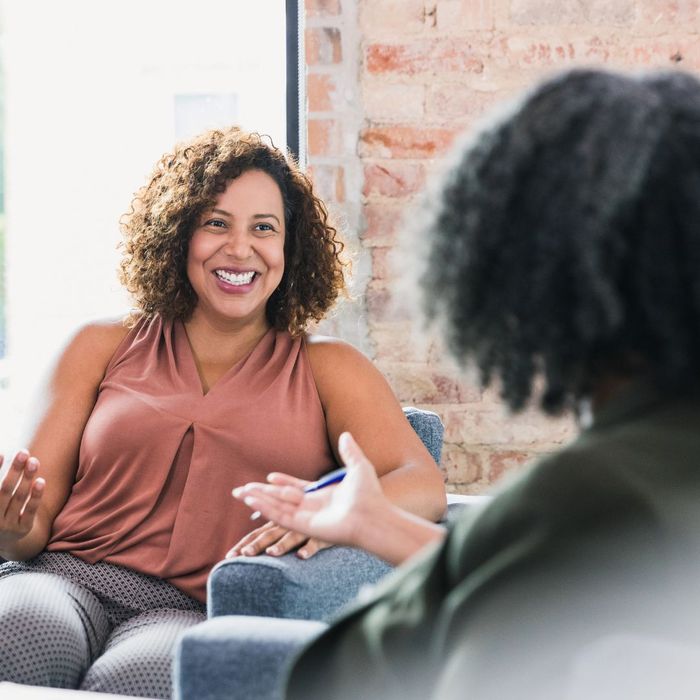 woman talking to therapist