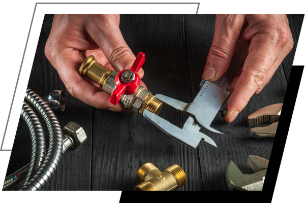 plumber working on a valve