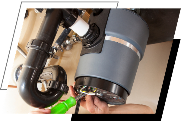 garbage disposal being repaired