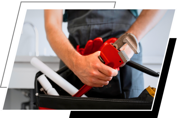 plumber holding a wrench